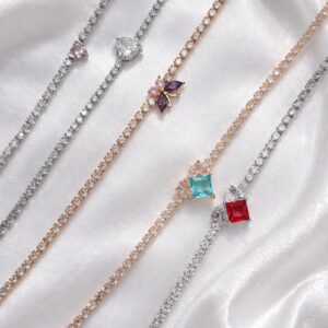 Silver Tennis bracelet with a red ruby heart stone