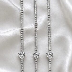 Silver tennis bracelet with a Silver heart stone